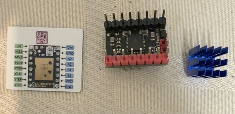 Stepper driver module, pinout reference card, and heat sink
