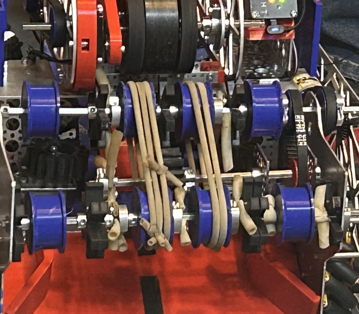 Close-up of physical FTC transfer rollers, belts, and hardware