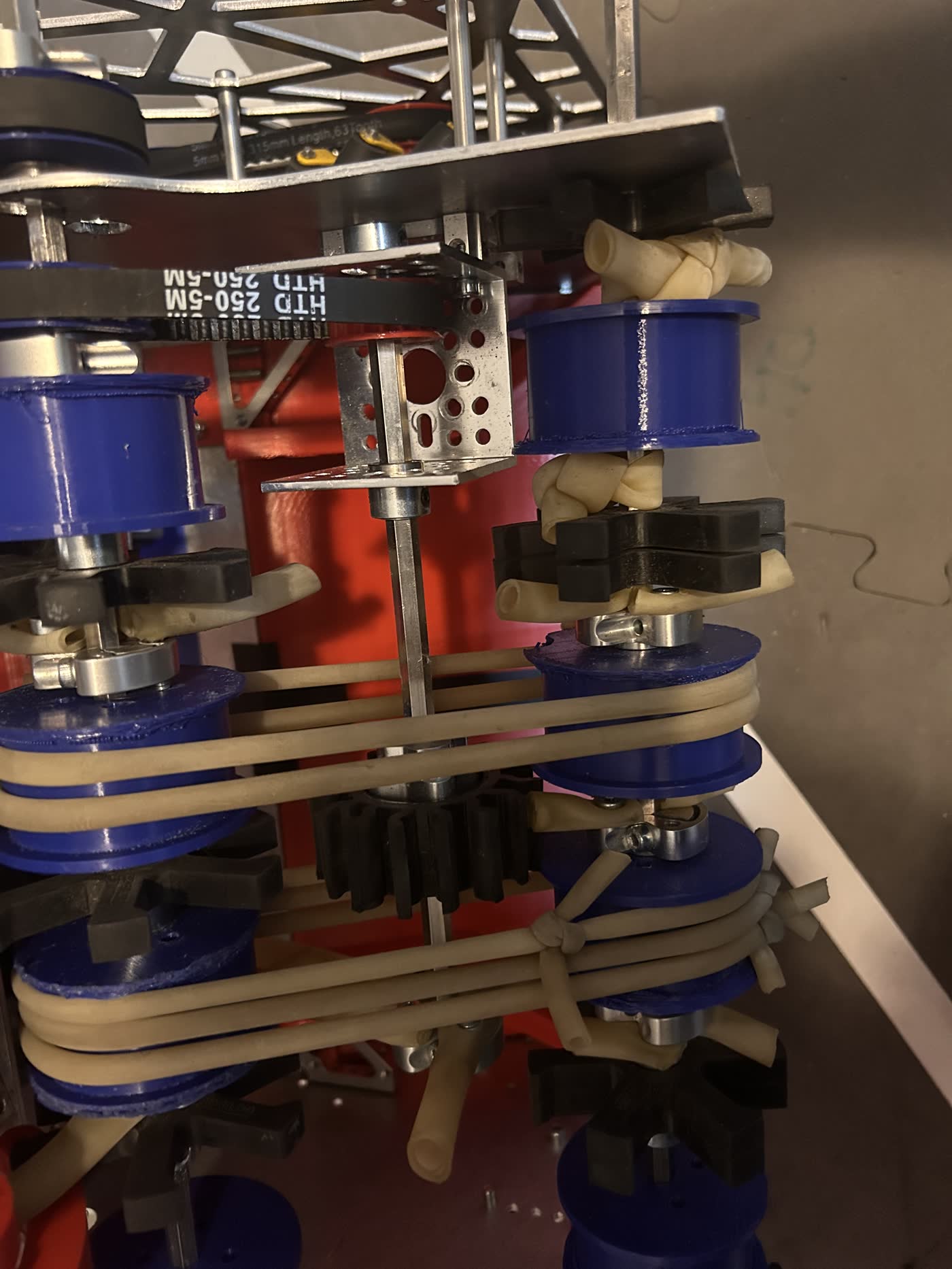Close-up of FTC belt routing, pulley stack, and transfer hardware